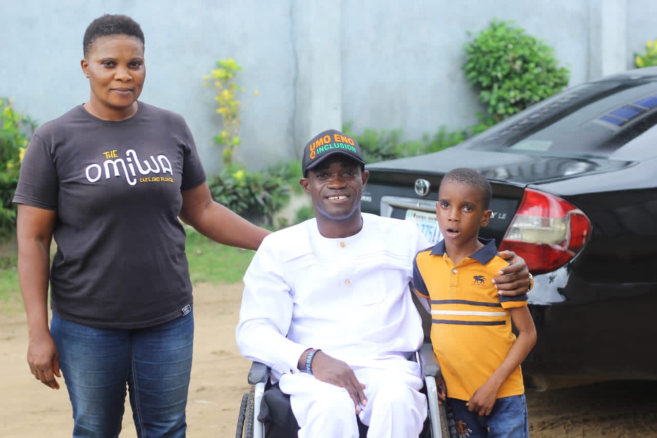 Governor’s aide hails AG for accepting to train boy with hearing, speech impairment 4 • Personal Assistant to Governor Umo Eno on persons with disabilities (PWDs), Cmrd. Ubong Ikpe (m) with Success Idongesit Johnson & his mother shortly after the meeting with the AG.