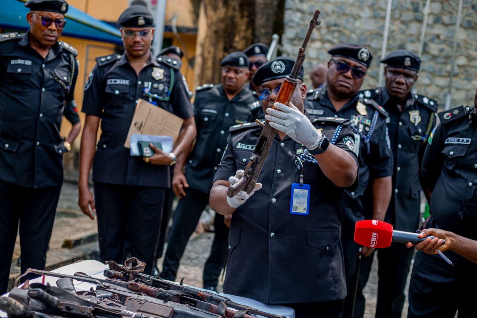 • CP Azare displaying one of the recovered firearms at the police headquarters, on Tuesday.
