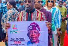 Lady Otong congratulates Tinubu, Gov Eno on their victories at APC primaries 7 • Prince Ukpong Akpabio displaying President Tinubu's poster during the presidential primary election in Ukana West ll Ward in Essien Udim LGA