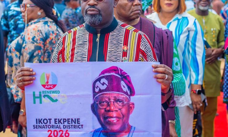 Lady Otong congratulates Tinubu, Gov Eno on their victories at APC primaries 4 • Prince Ukpong Akpabio displaying President Tinubu's poster during the presidential primary election in Ukana West ll Ward in Essien Udim LGA