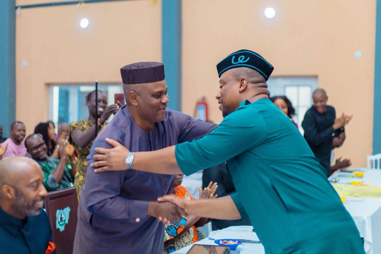 NUJ leadership summit charts new course for professionalism, union growth in Akwa Ibom 11 • National Publicity Secretary of the PDP, Comrade Ini Ememobong (R) exchanging pleasantries with the Akwa Ibom State Commissioner for Information, Mr Aniekan Umannah