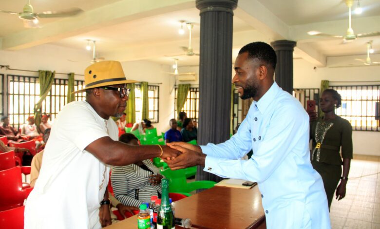 Ex-lawmaker, Akpanusoh, urges journalists to strengthen advocacy, investigation in Nigeria’s extractive sector 1 • Akpanusoh (L) exchanging pleasantries with the Chairman of NUJ, Comrade Nsibiet John